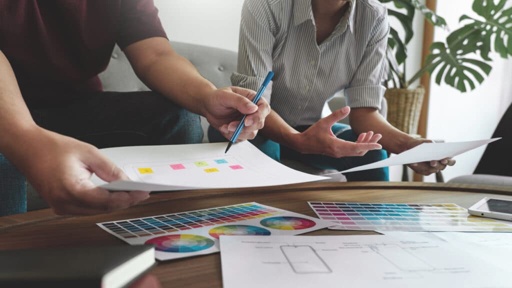 Two people working on a design project.